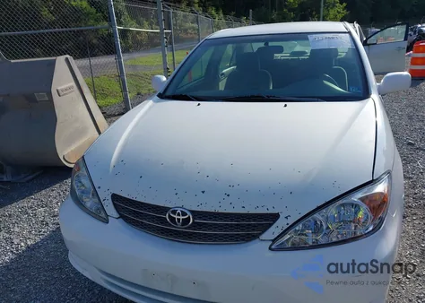 2004 Toyota Camry Le z USA, uszkodzony, nr VIN 4T1BE32K84U363179